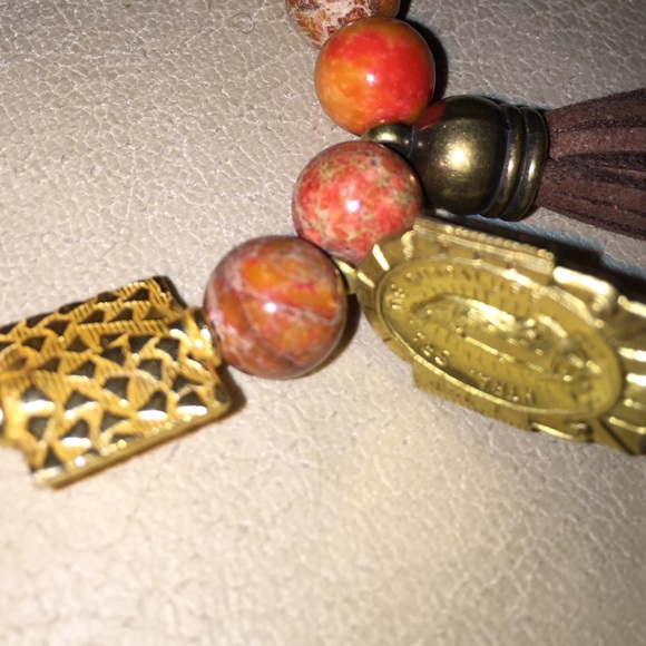 Polished stone bracelet with leather tassel saint - Picture 3 of 3