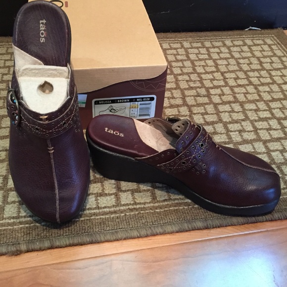 New brown wedged heal Melissa slip on.