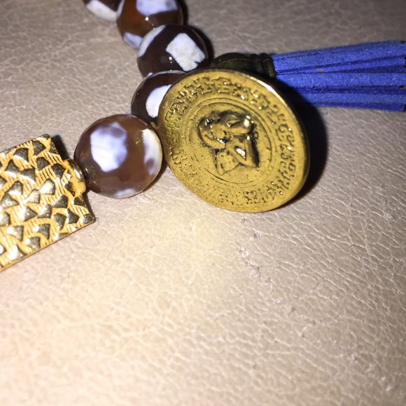 Polished stone bracelet with leather tassel charm - Picture 2 of 3