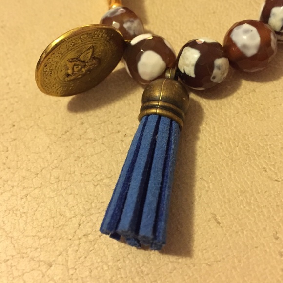 Polished stone bracelet with leather tassel charm - Picture 3 of 3