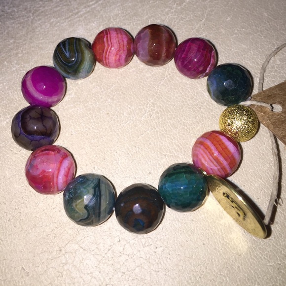 Multi polished stone bracelet with gold bead