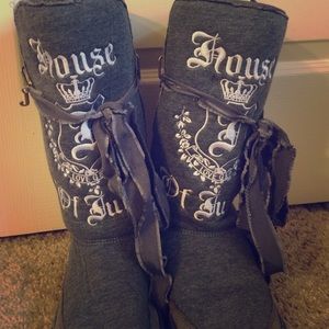 A pair of Juicy Couture boots