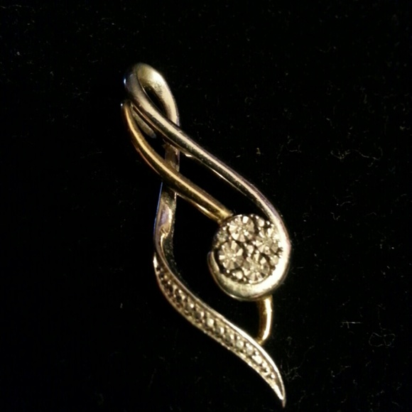 14k+925 pendant two tone.