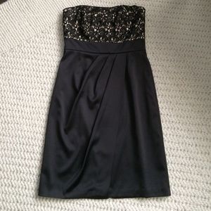 Black strapless satin and embroidered dress