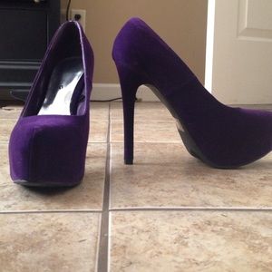 Purple suede heels.