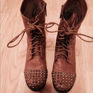 Brown combat boots with gold studs