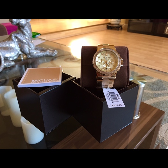 For sale 💯% Authentic Ladies MK watch.