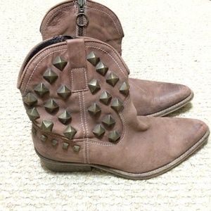 Brown studded booties.