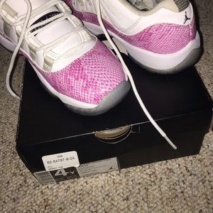 Jordan Pink Snakeskin 11 Low's size 4Y