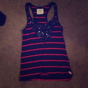 Red and blue stripes tank with design