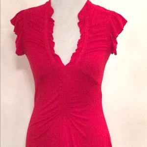 Red form fitting ruched top