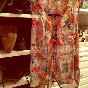 Sheer adorable floral top with embellished buttons