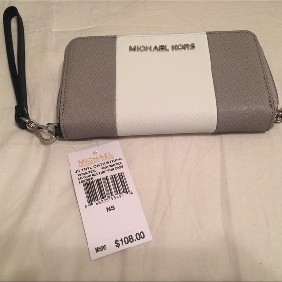 *ON HOLD* Michael Kors traveler phone case/wallet