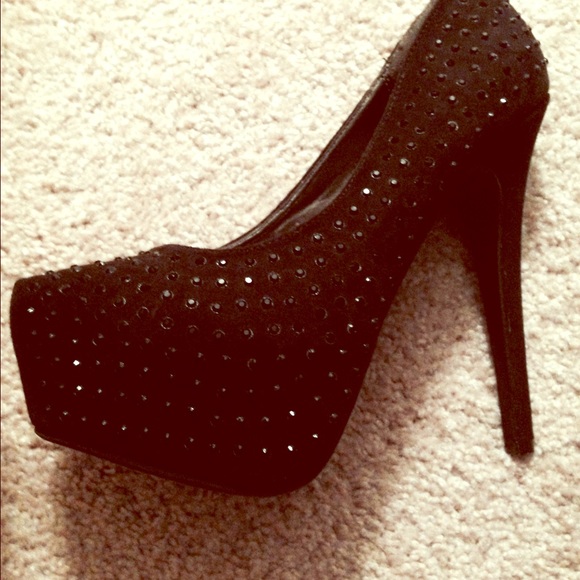 Black studded pumps