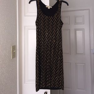 Black and gold studded MK dress.