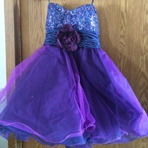 Short purple dress.