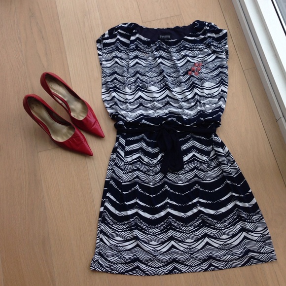 Navy and white stretch dress with tie belt.