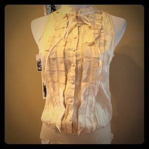 Cute top with buttons and shirred waist.  NWOT.