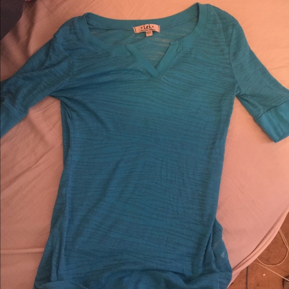 Lei half sleeved shirt. Size large