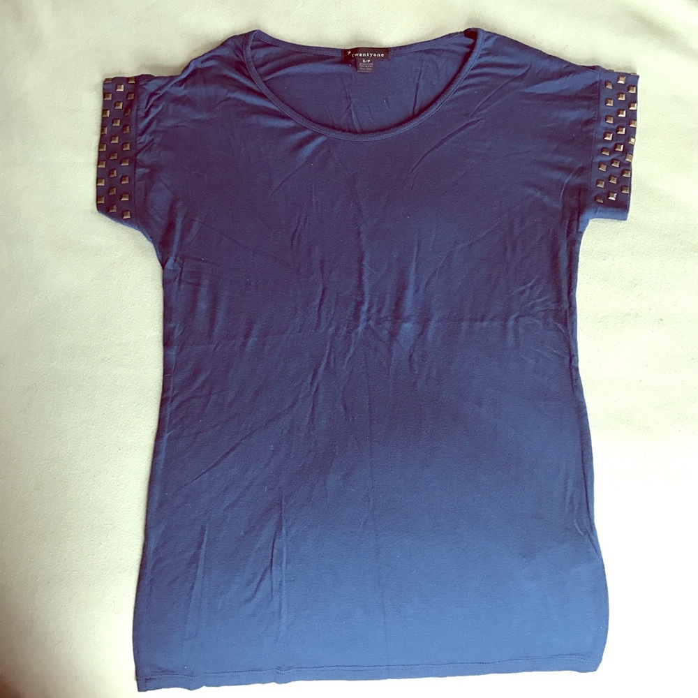 Dark blue top with gold studded sleeves