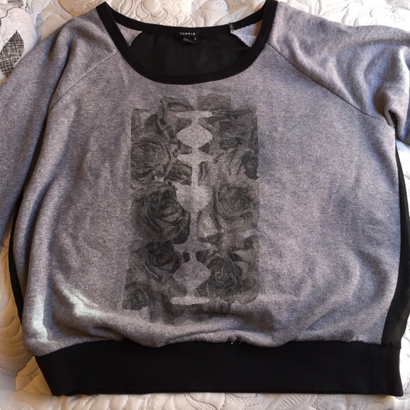 Gray sweater with an old fashioned blade