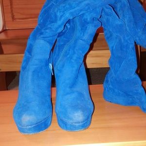 Knee high blue heeled boots