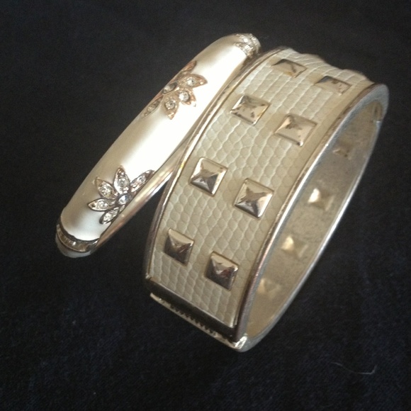 2 bracelets ~white with gold detail.
