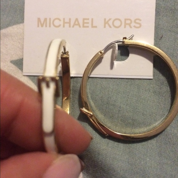 Authentic Michael Kors white buckle earrings