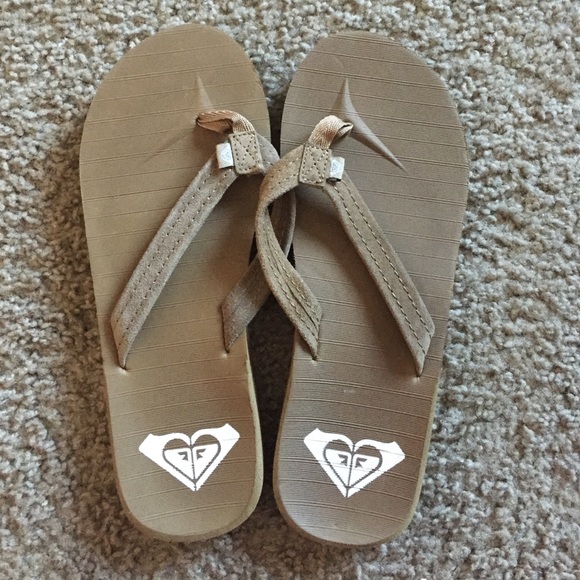 Brand new roxy flip flops.