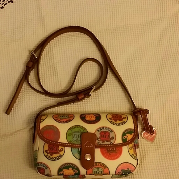 Dooney and Bourke  small purse w/adjustable straps
