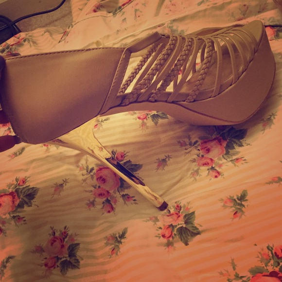 Nude with gold heels