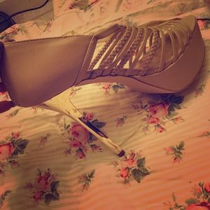 Nude with gold heels