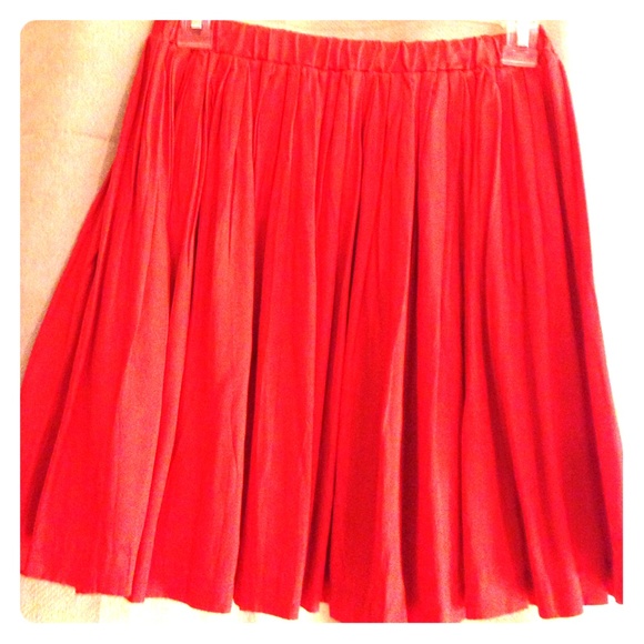 Orange Pleated Mini Skirt.