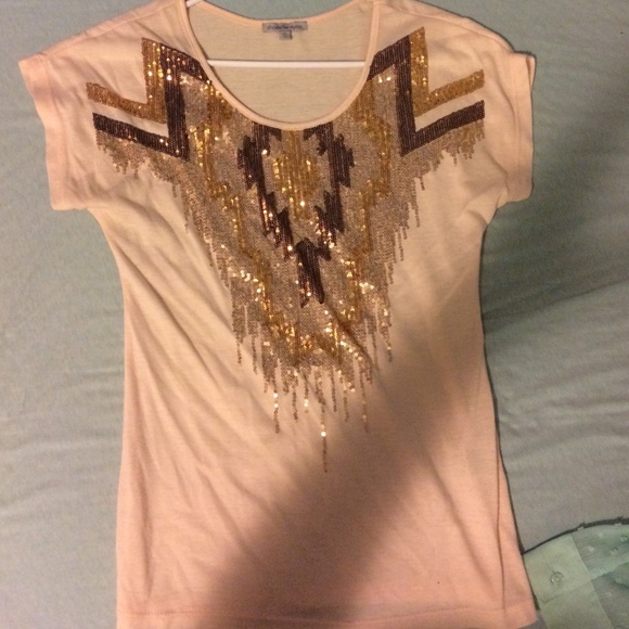 A short sleeve shirt, worn once.