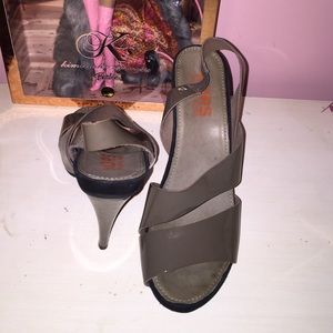 Gray patent leather heels by kors