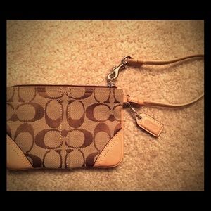 Tan Coach wristlet