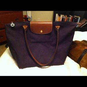 Long champ purple purse large, some wear and tear