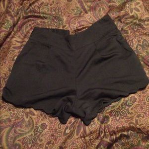 Black petal shorts.