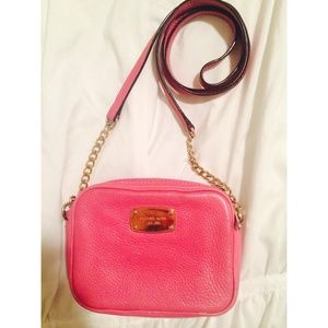 Hot pink Michael Kors crossbody purse