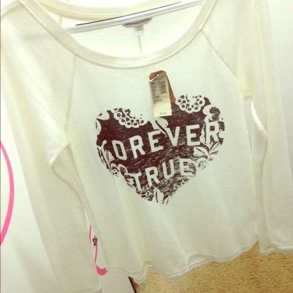 Forever True long sleeve, cream colored shirt.