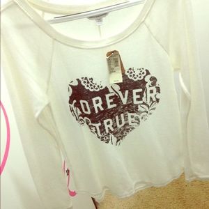 Forever True long sleeve, cream colored shirt.