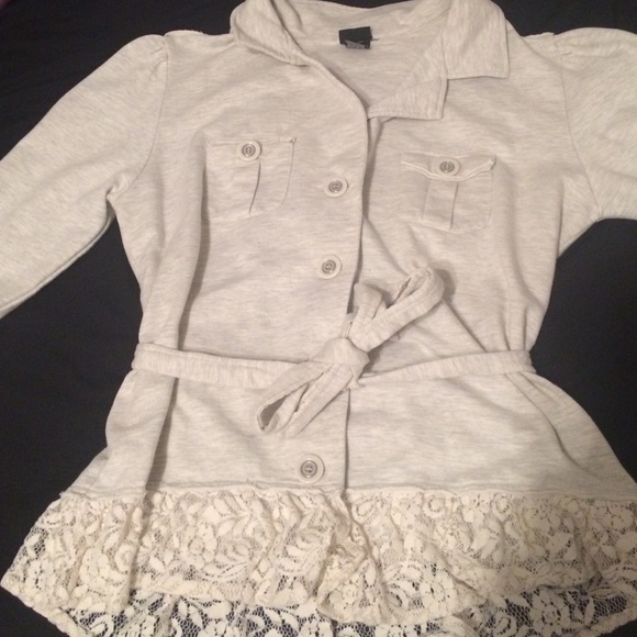 Vanity jacket with lace at the bottom and belt