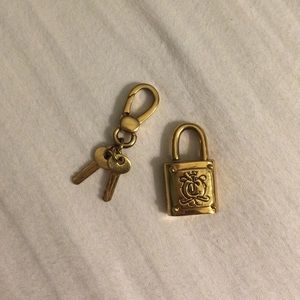 Two juicy couture charms reserved for @krazygirl