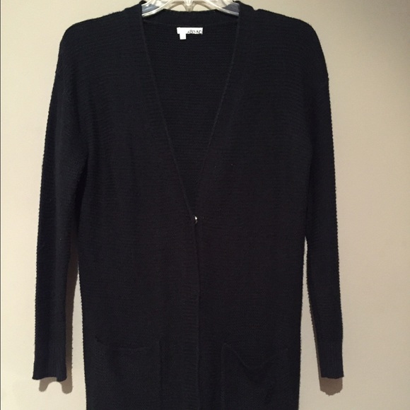 Black cardigan with three buttons down the middle