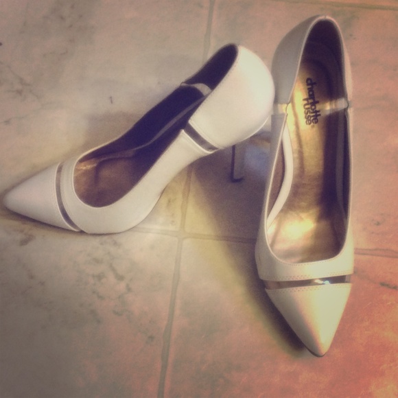 White patent pointed toe pumps