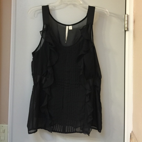 Black ruffle sleeveless top with belted waist