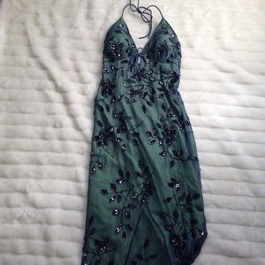 Beautiful beaded asymmetric halter style dress