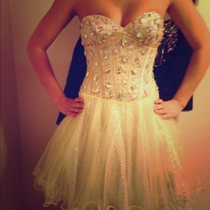 From Senior Homecoming and only worn once.
