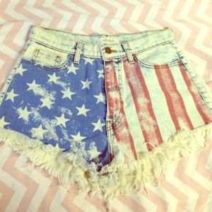 AMERICAN FLAG denim shorts with frayed bottoms