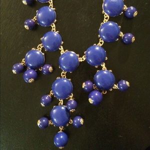 Blue and gold necklace.